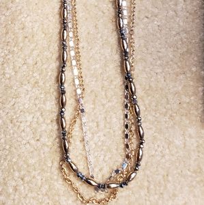 NWOT Multi silver & gold strand necklace. Costume Jewelry.